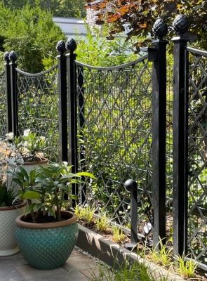 Add a sense of privacy and solitude by enclosing a garden area with fencing by Classic Garden Elements